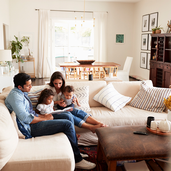 family enjoying comfy living room