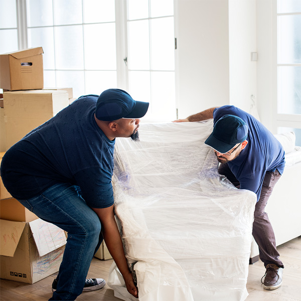 movers helping deliver new furniture